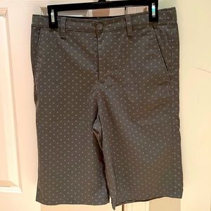 UA boys golf shorts